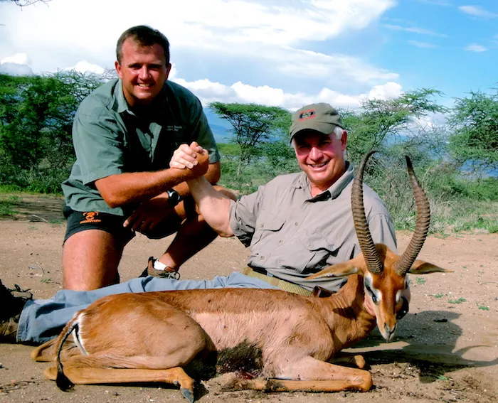 Brian Van Blerk with a Cape buffalo in Zimbabwe