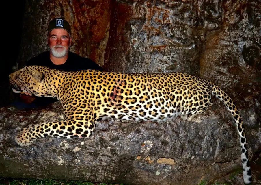 Brian Van Blerk with a trophy leopard in Zimbabwe